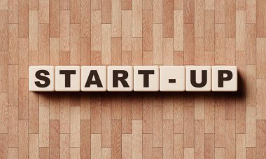 Kelime bloğu küpleri lamine arka planda Start-Up. Girişimci ve Küçük işletme girişimcisi KOBİ konsepti. 3B illüstrasyon oluşturma