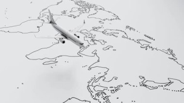 Seamless looping plane flies above white paper map of the world travel background. Travel and wanderlust concept. 3D illustration rendering