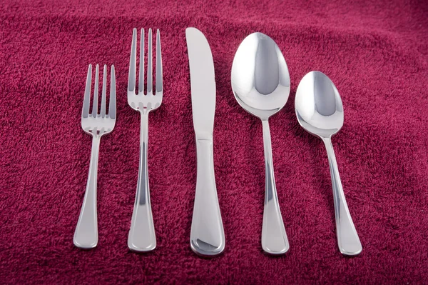 Kitchen silverware on textile — Stock Photo, Image