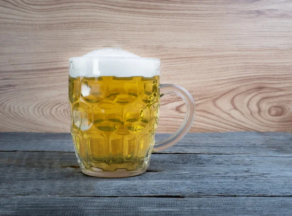 Glass of beer on wood background horizontal — Stock Photo, Image