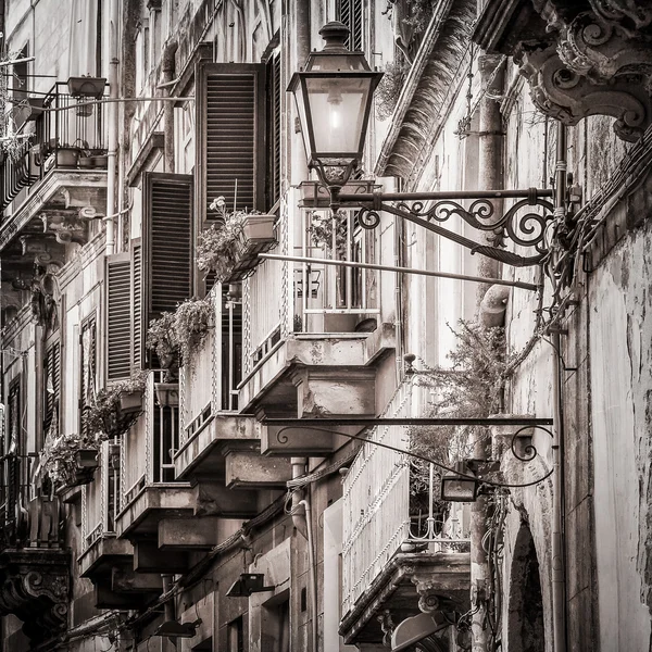 Beautiful vintage balconies and street lamp in old mediterranean — Stock Photo, Image