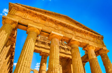 Ruins of ancient temple front pillars in Agrigento, Sicily clipart