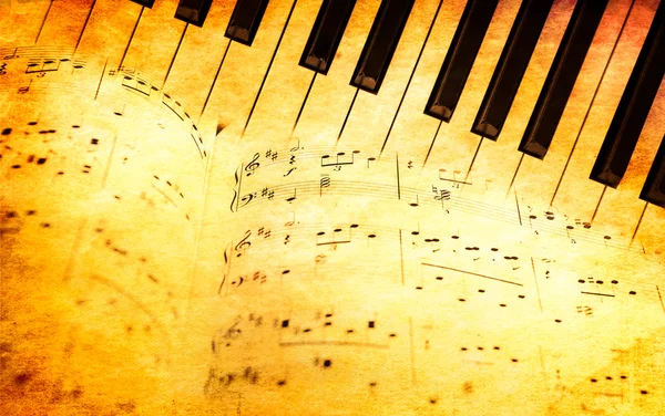 Klavírní klávesnice a hudební listy v retro stylu — Stock fotografie