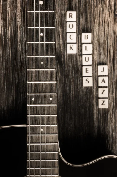 Detalhe da guitarra e sinais rock blues jazz em estilo vintage — Fotografia de Stock