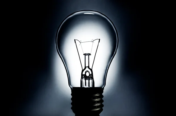 Electric light bulb with dark background — Stock Photo, Image