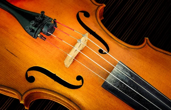 Detail of violin in filtered glow style — Stock Photo, Image