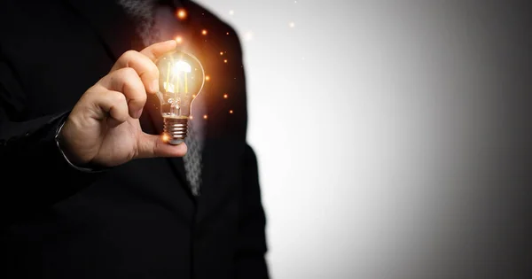 Businessman Holding Light Bulb Bright Light Concept Job Thinking Business — Stock fotografie