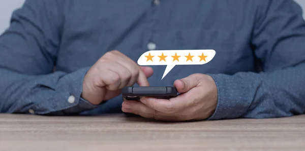 Customers rate 5 stars satisfaction via mobile phone. satisfaction score Service experience, online questionnaire