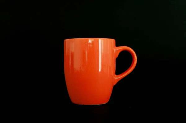 マグカップ 濃紺地に孤立したオレンジティーマグカップやカップのプロフィール — ストック写真
