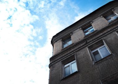 Beautiful old building facade against the blue sky