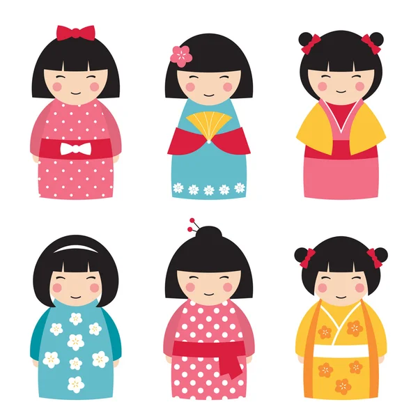 Poupées mignonnes dans le style japonais — Image vectorielle