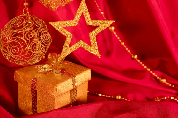 Golden christmas decoration and gift — Stock Photo, Image