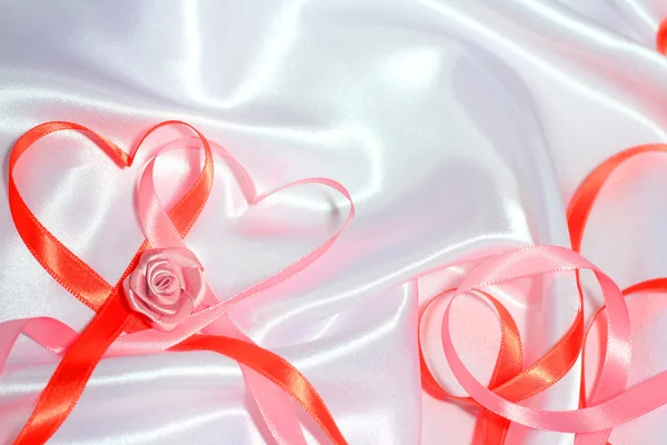 Red ribbon hearts — Stock Photo, Image