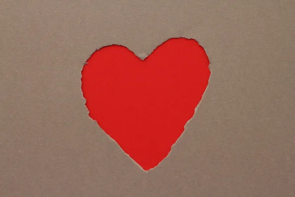 Разорванное сердце на бумаге — стоковое фото