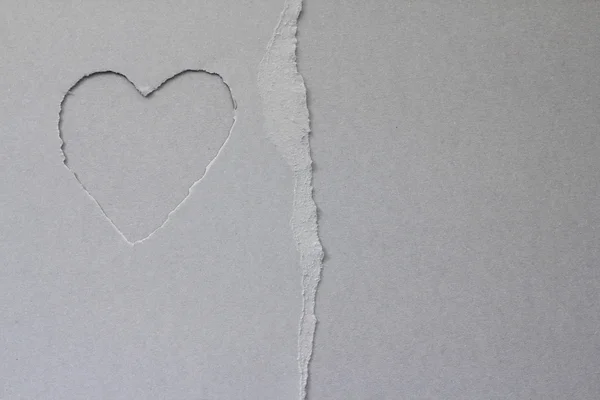 Torn heart in paper — Stock Photo, Image