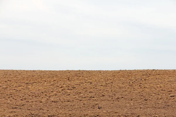 Terra lavrada a seco terras agrícolas — Fotografia de Stock