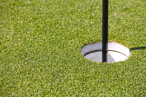 Golf hole and flag — Stock Photo, Image