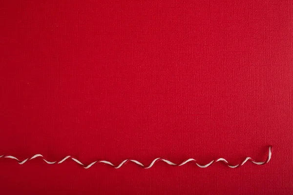 Résumé Fond Noël Papier Rouge Corde Traditionnelle Décorative Bouclée Rayée — Photo