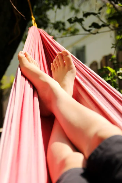 Feet in a hammock — Stok fotoğraf