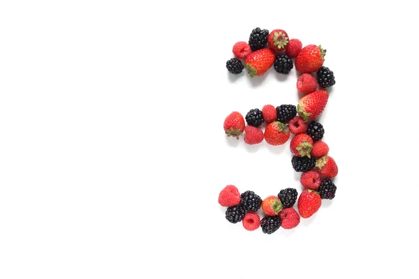 Номер три с фруктами — стоковое фото
