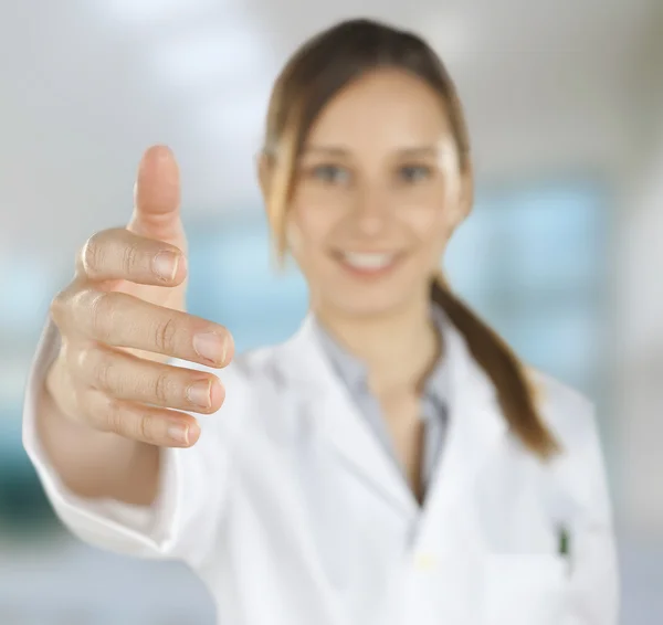 Medical . Young doctor woman giving hand — Stock Photo, Image