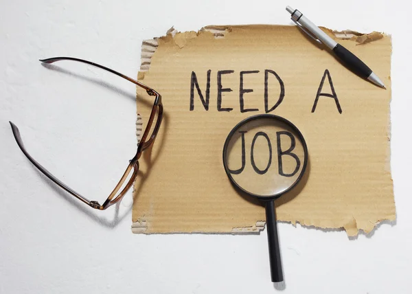 Cardboard that says need a job — Stock Photo, Image