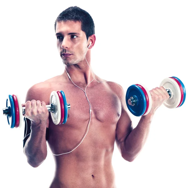 Joven levantando pesas aisladas en blanco — Foto de Stock