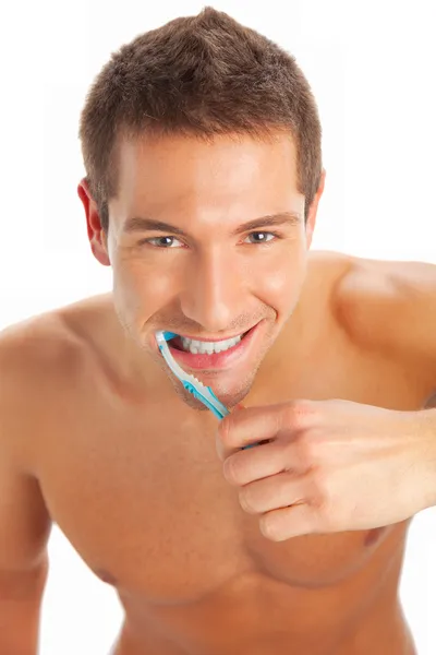 Joven lavándose los dientes —  Fotos de Stock