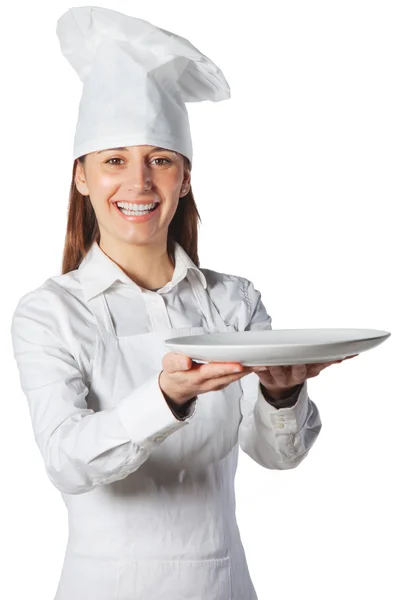 Happy cook woman holding a dish — Stock Photo, Image