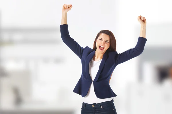 Success yong business woman celebrating screaming — Stock Photo, Image