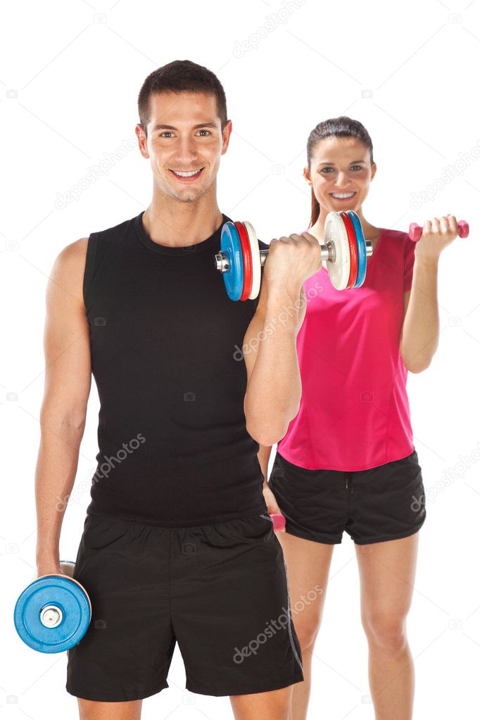 Young man and woman lifting weights. Isolated on white