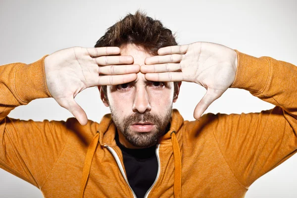 Portrait of a normal boy with hands on forehead — Stock Photo, Image