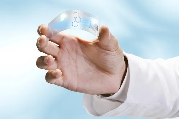 Close up of a scientific holding one piece transparent of graphene application. — Stock Photo, Image