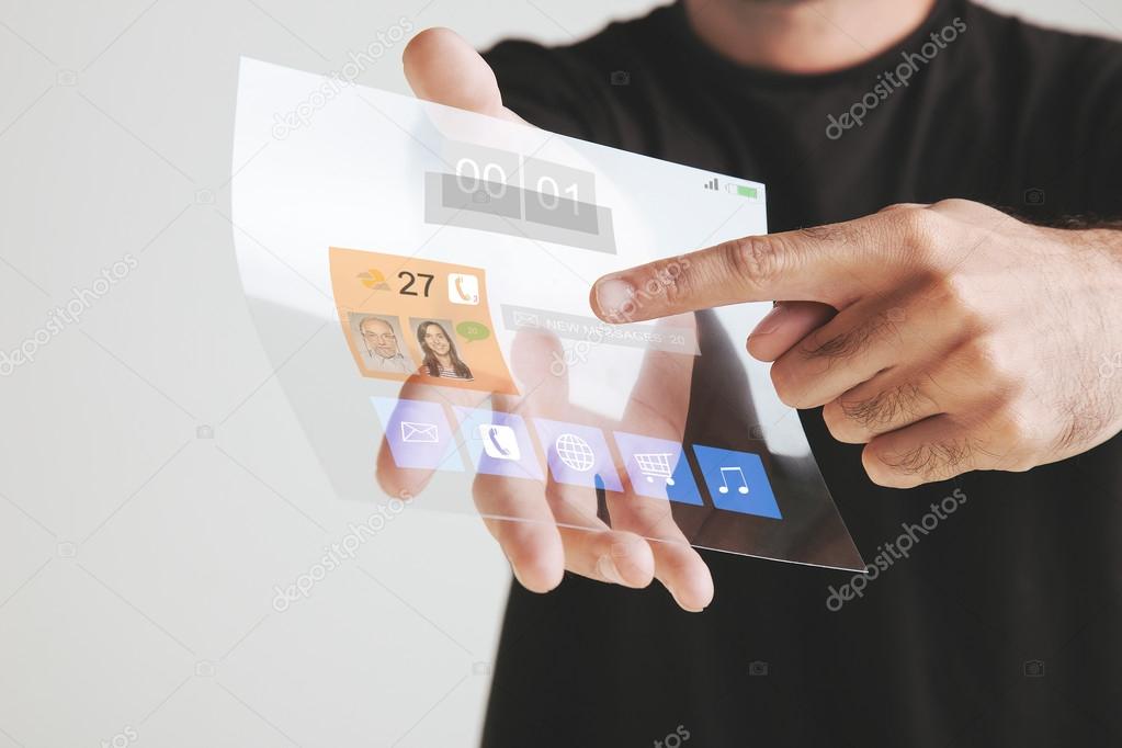 Hand holding transparent future tablet made of graphene. Concept.