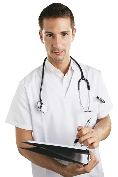 Joven médico con estetoscopio escribiendo en un cuaderno . — Foto de Stock