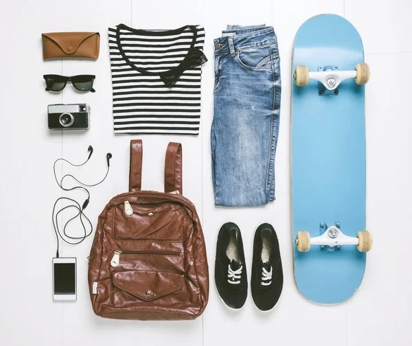 Overhead of essentials skater woman. — Stock Photo, Image