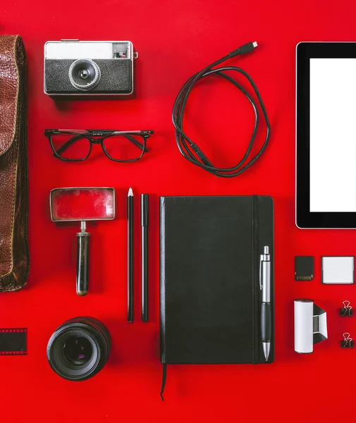 Closeup of different photography objects on red background. — Stock Photo, Image