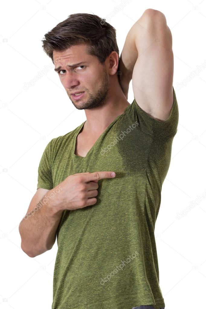 Man sweating very badly under armpit and pointing there