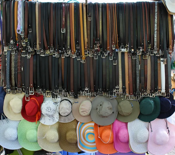 Belts and hats for sale — Stock Photo, Image