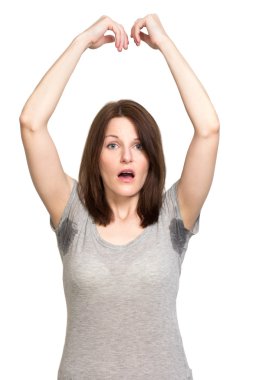 Woman sweating very badly under armpit clipart