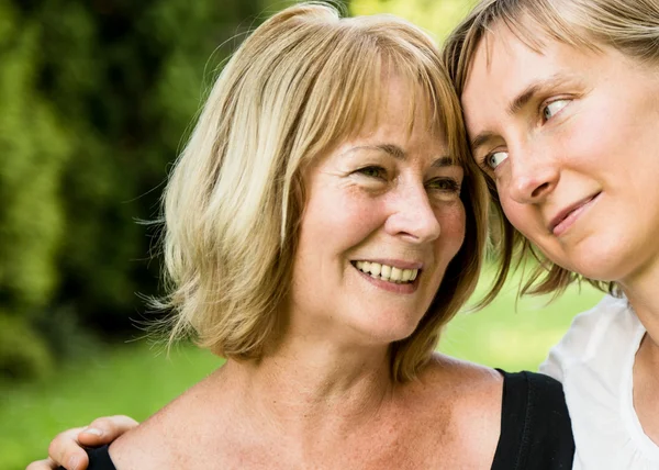 Senior woman with child portrait — Stock Photo, Image