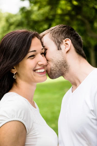 Young kissing couple in love Stock Image