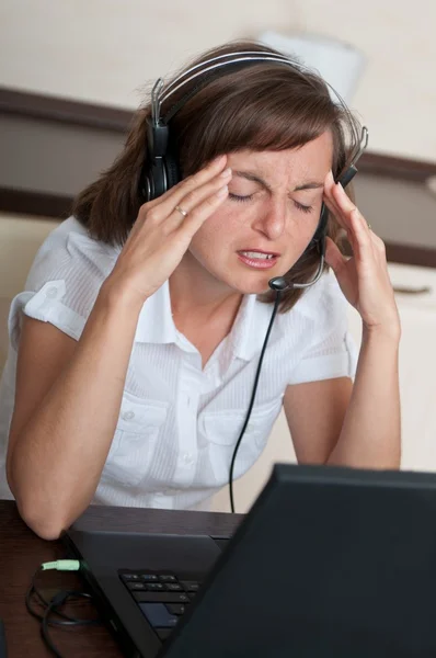 Business woman with headache — Stock Photo, Image