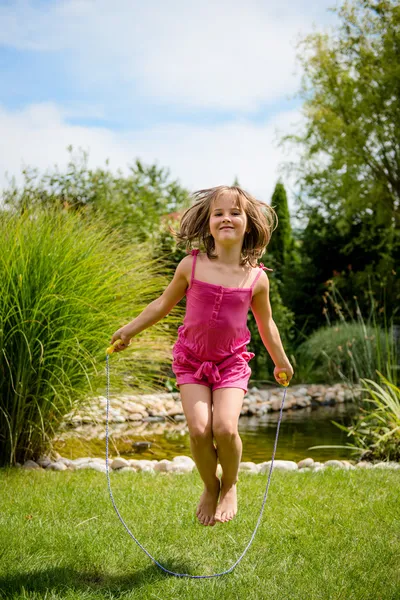 Jumping with skipping rope — Stock Photo, Image