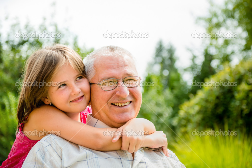 Happy grandfather with grandchild