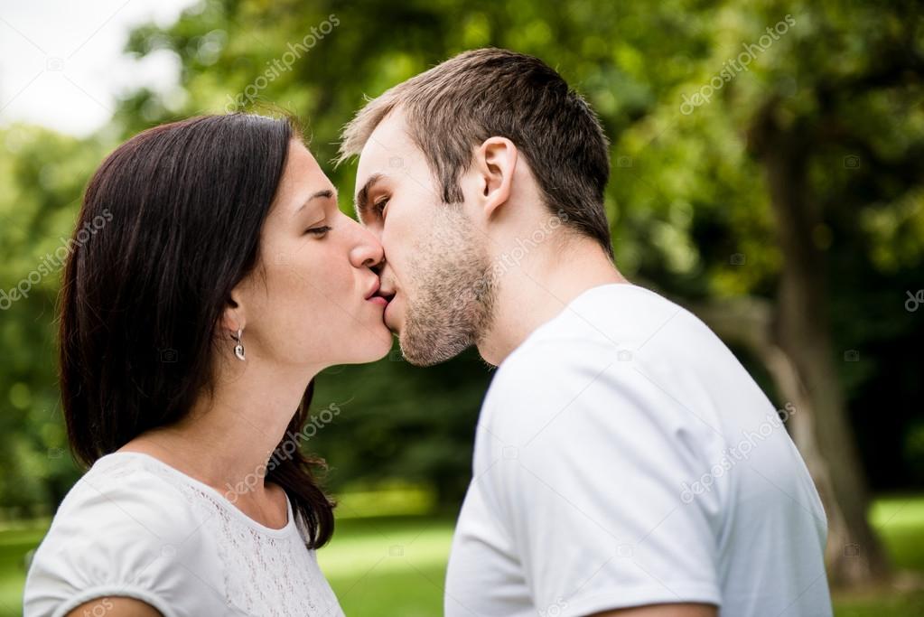 Young kissing couple in love