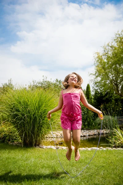 Jumping with skipping rope — Stock Photo, Image