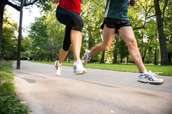 Jogging couple - detail of legs — Stock Photo, Image