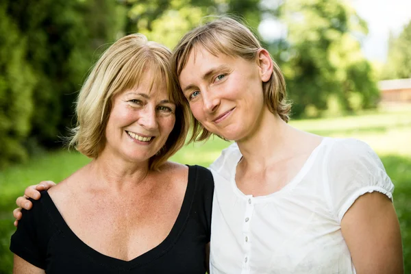 Senior mother with child portrait — Stock Photo, Image