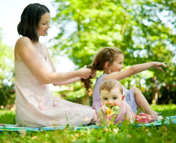 Real moments - mother with children — Stock Photo, Image